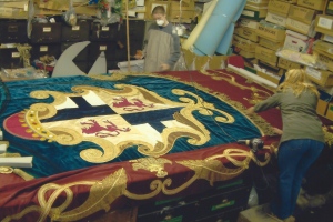 The 'Casanova' banner being worked on in the workshop with Emma and Carole.