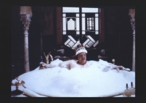 'King Ralph' in his bath.  Photo suppled by the production